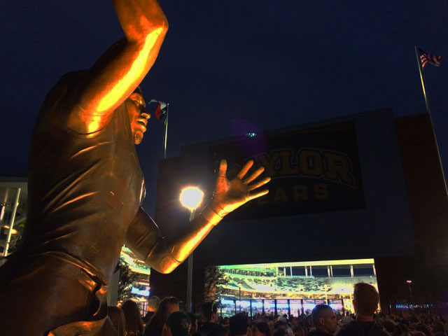 This statue of Robert Griffin III greets fans at McLane Stadium. (WTOP/Noah Frank)