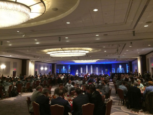 A group of nearly 500 gathered at the JW Marriott Friday for the Military Bowl luncheon. (WTOP/Noah Frank)