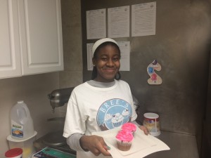 Bree Britt, 16, stands in the kitchen of her Maryland bakery. (WTOP/Rachel Nania) 