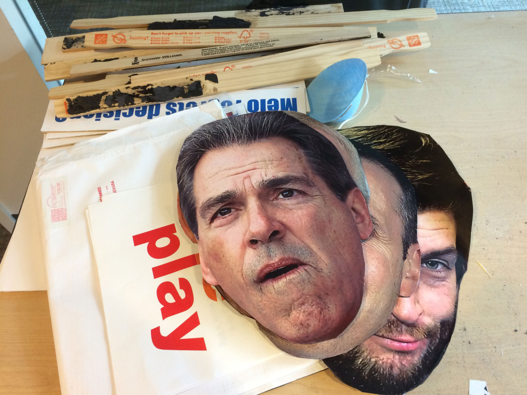Rydholm still prints, cuts and pastes together the Heads on Sticks that appear on the show. (WTOP/Noah Frank)