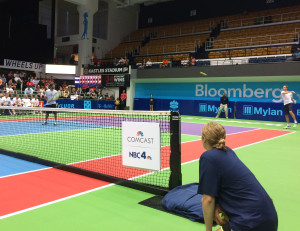 Querrey (hitting) partnered with D.C. United coach Ben Olsen in the Kastles Charity Classic last week. (WTOP/Noah Frank)