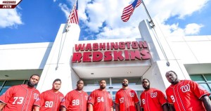 Members of the Washington Redskins defensive line throw out the first pitch before the game between the Washington Nationals and the Philadelphia Phillies at Nationals Park on September 27, 2015 in Washington, DC. (@Redskins/Twitter)