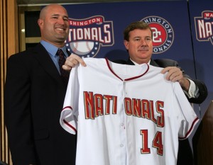 Bowden (right) says the Lerners only ended up with Manny Acta in 2007 because they wouldn't pay for Joe Girardi. (AP Photo/Lawrence Jackson)