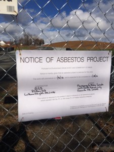 This asbestos warning sign at the construction site for a Bethesda-Chevy Chase Middle School has alarmed some neighbors, who say the school system could improve the way it's communicating about the project. (WTOP/Dick Uliano)