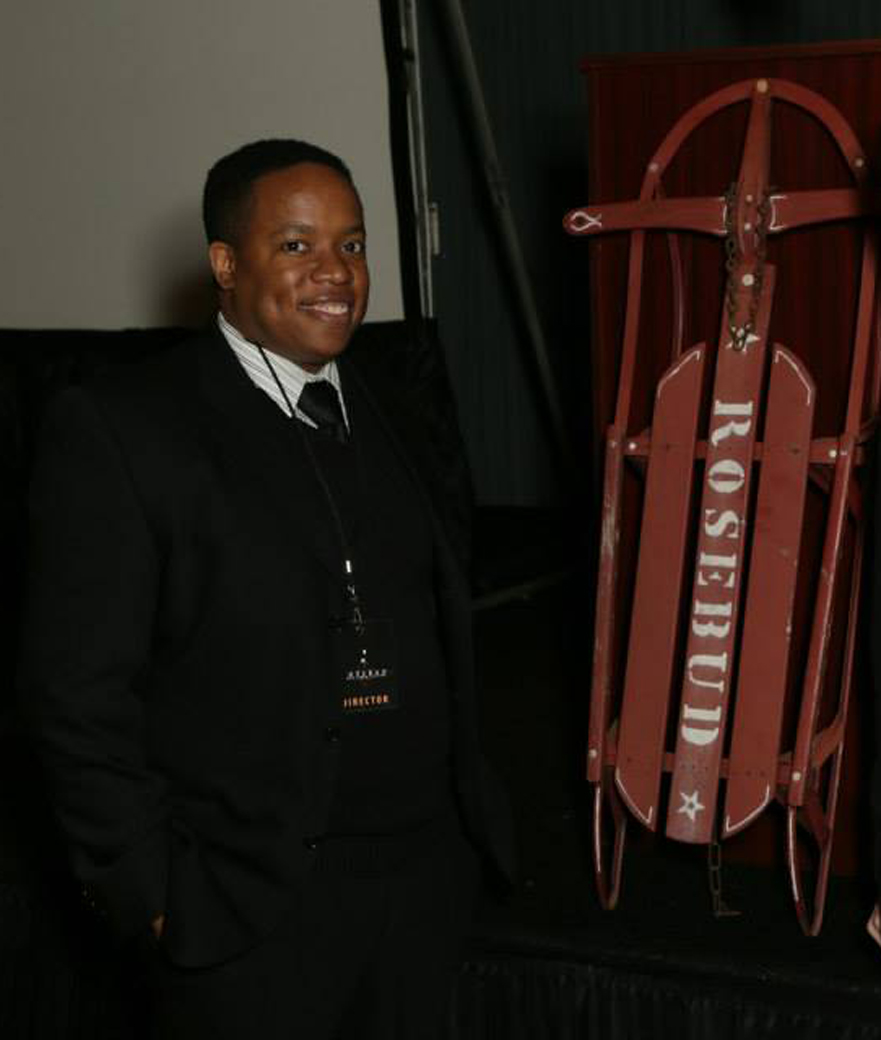 Festival Director Kevin Sampson poses with the "Rosebud" sled at the 2015 Rosebud Film Festival. (Courtesy Rosebud)