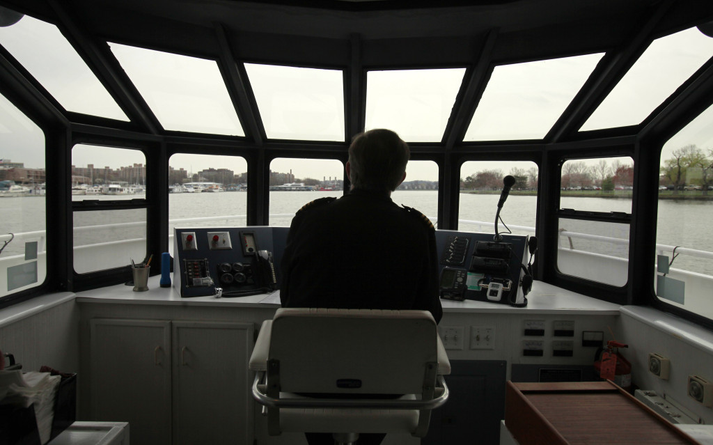 Eric Slaughter captains the boat during a DC Cruises tour on the Potomac River in Washington on Thursday, March 25, 2010. (AP Photo/Jacquelyn Martin)
