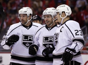 Williams (left) and Richards (center) Mike won a pair of titles together in Los Angeles. (AP Photo/Alex Brandon)