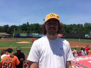 Winner of the 2016 Bowie Baysox 1K Beer Run Chris Sachs, who got to throw out a ceremonial first pitch. (WTOP/Noah Frank)