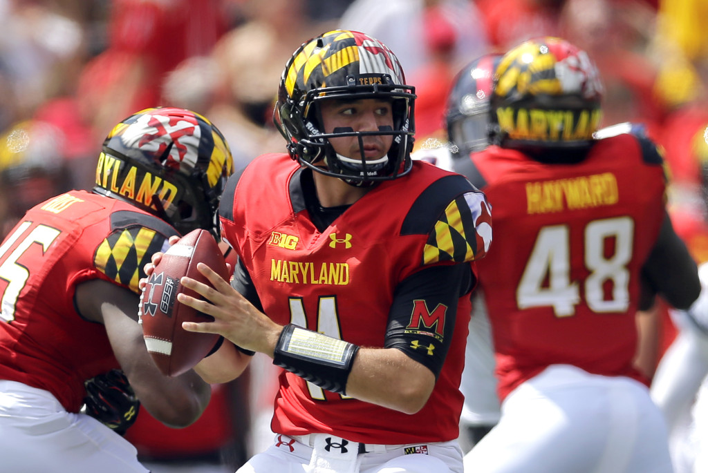 FILE - In this Sept. 5, 2015, file photo, Maryland quarterback Perry Hills looks for a receiver in the first half of an NCAA college football game against Richmond, in College Park, Md. (AP Photo/Patrick Semansky, FIle)