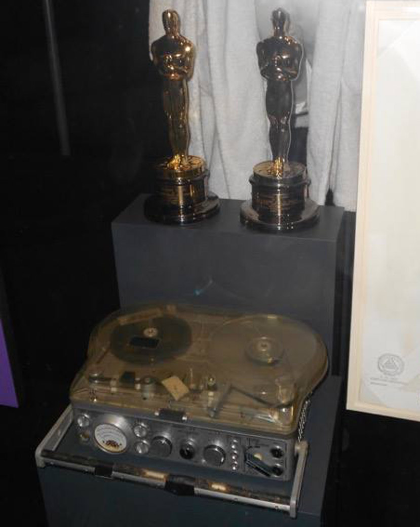 This exhibit shows Russell's two Oscars and Nagra recorder at the National Museum of African American History & Culture. (Courtesy Russell Williams via Mark M Harris)