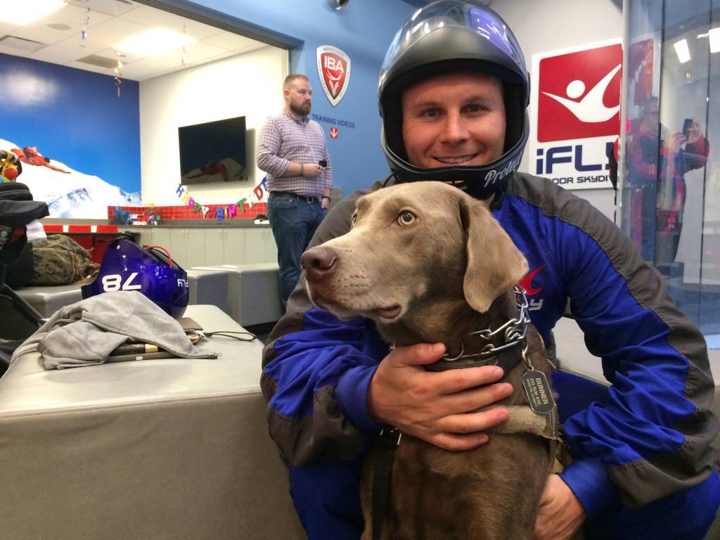 Andrew Einstein and his service dog, Gunner. (WTOP/Noah Frank)