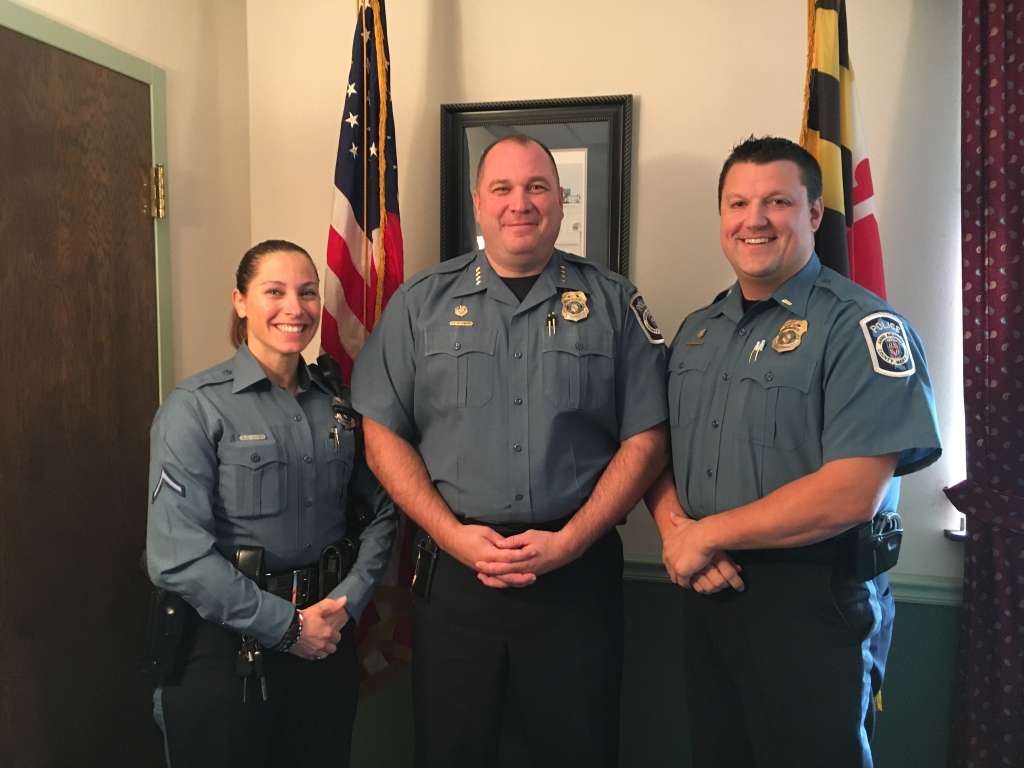 “If we did not have naloxone, our fatal overdose numbers would be double what they are. And they’re double what they were last year anyway,” said Anne Arundel County Police Chief Tim Altomare (center). Officer Gina Chen (left) saved a 19-year-old woman with naloxone in May. Lt. Ryan Frashure is shown on the right. (WTOP/Jamie Forzato)