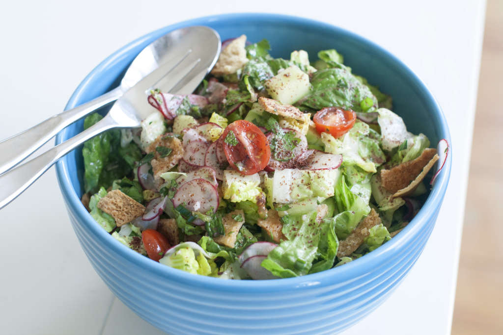 This April 14, 2014, photo shows fattoush, a salad with pita crumble in Concord, N.H. (AP Photo/Matthew Mead)