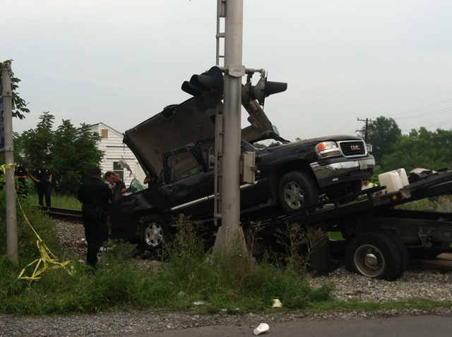 CSX train collides with SUV in Md., trapping the driver