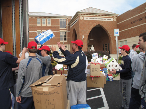With Sandy donations, Lombardozzis show young athletes what the holiday season is about