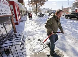 Shoveling heavy, wet snow risks back and shoulder injuries