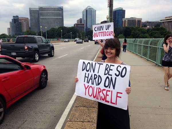 Group hits Key Bridge to encourage smiles in D.C.