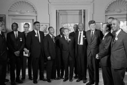 President Kennedy poses August 28, 1963 at the White House with a group of leaders of the March on Washington.  From left, Whitney Young, National Urban League; Dr. Martin Luther King, Christian Leadership Conference; John Lewis, Student Non-violent Coordinating Committee;  Rabbi Joachim Prinz, American Jewish Congress; Dr. Eugene P. Donnaly, National Council of Churches; A. Philip Randolph, AFL-CIO vice president; Kennedy; Walter Reuther, Unidted Auto Workers; Vice-President Johnson, rear, and Roy Wilkins, NAACP. (AP Photo)