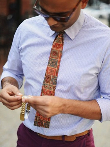 In a business casual world, what happens to the tie?