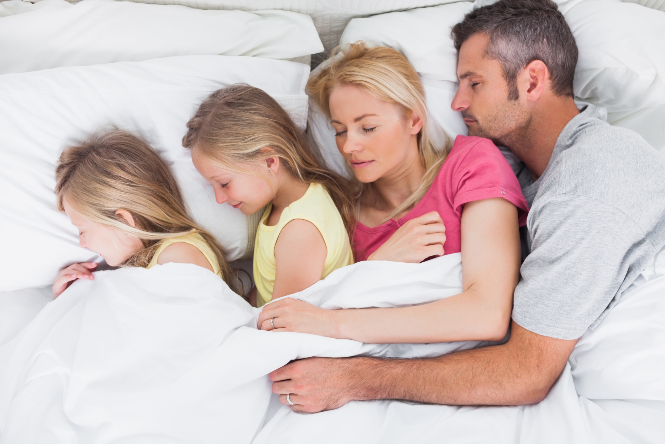 Is sleeping a group activity? How to get kids back in their own beds