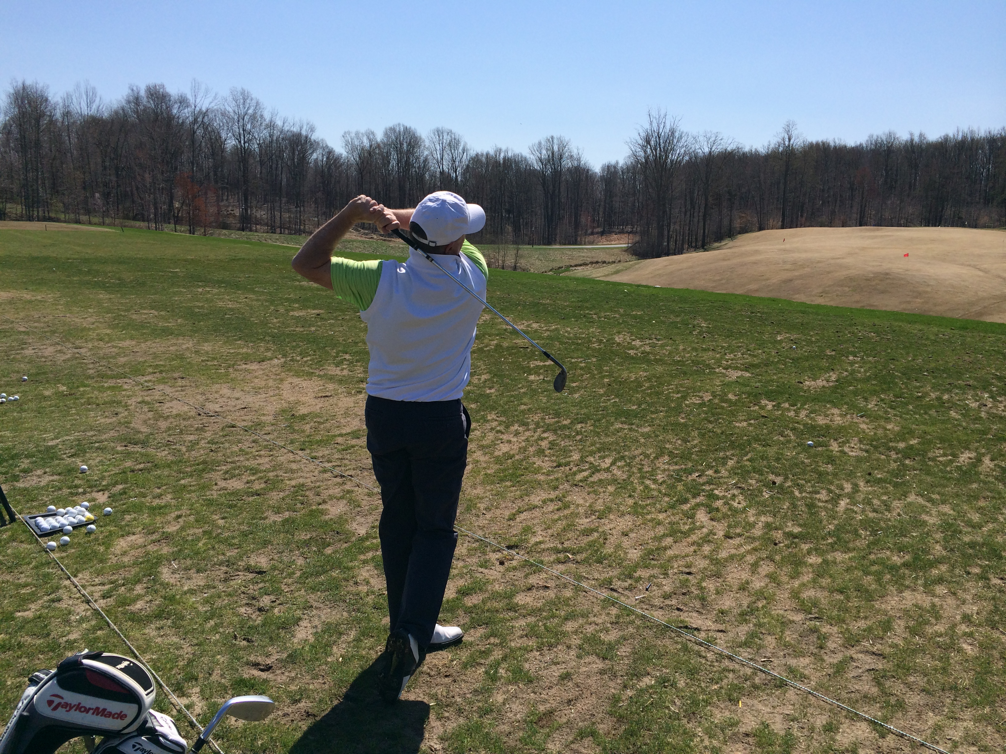 Golfers tee up in the spring weather