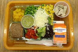A recent study suggests that something as simple as changing the placement of a salad bar could help millions of kids make healthier choices on their own. (AP Photo/Ted S. Warren)