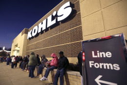 A line of Thanksgiving shoppers forms at the entrance to a Kohl's department store in Sherwood, Ark., Thursday, Nov. 27, 2014. Early-bird shoppers headed to stores around the nation on Thanksgiving in what's becoming a new holiday tradition. (AP Photo/Danny Johnston)