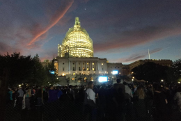 Visitors file in to the West Lawn of th White House for Pope Francis' address at about 6:30 a.m. Thursday, Sept. 24, 2015. (WTOP/Dennis Foley)