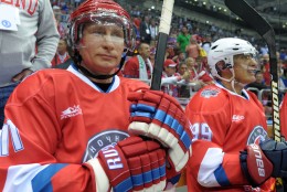 FOR USE AS DESIRED, YEAR END PHOTOS - FILE - Russian President Vladimir Putin takes part in an ice hockey match between Russian amateur players and ice hockey stars at a festival of Russia's amateur hockey organized by the Night Hockey League in the Bolshoy arena in the Olympic Park in the Black Sea resort of Sochi, Russia, Saturday, May 10, 2014. (AP Photo/RIA-Novosti, Alexei Druzhinin, Presidential Press Service, File)