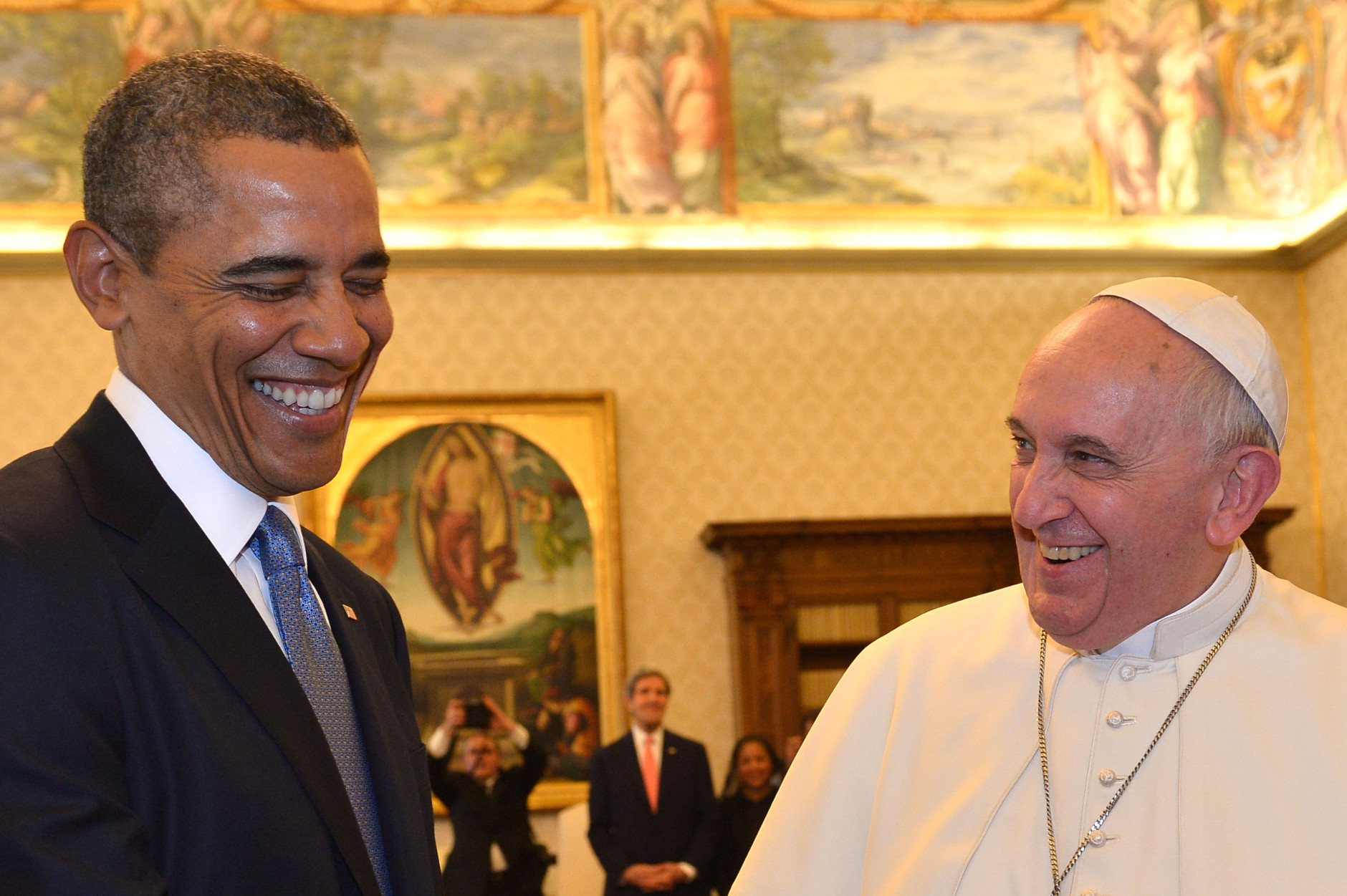 FOR USE AS DESIRED, YEAR END PHOTOS - FILE - Pope Francis and President Barack Obama smile as they meet at the Vatican Thursday, March 27, 2014. A visibly energized President Barack Obama held a nearly hourlong audience with Pope Francis at the Vatican, expressing his great admiration for the pontiff and inviting him to visit the White House. (AP Photo/Gabriel Bouys, File Pool)