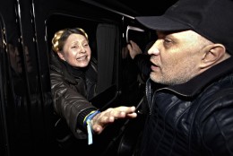 FOR USE AS DESIRED, YEAR END PHOTOS - FILE - Former Ukrainian Prime Minister Yulia Tymoshenko is greeted by supporters shortly after being freed from prison in Kharkiv, Ukraine, Saturday, Feb. 22, 2014. (AP Photo/Sergey Kozlov, File)