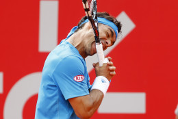 FOR USE AS DESIRED, YEAR END PHOTOS - FILE - Fabio Fognini of Italy bites his racket during the final match of the Buenos Aires' Copa Claro tennis Open against David Ferrer of Spain in Buenos Aires, Argentina,  Sunday, Feb. 16, 2014. (AP Photo/Victor R. Caivano, File)