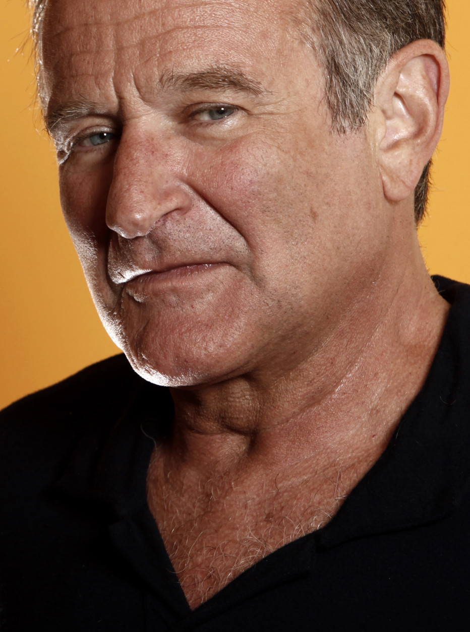 FOR USE AS DESIRED, YEAR END PHOTOS - FILE - This Aug. 14, 2009 file photo shows actor Robin Williams  in Los Angeles. Williams, whose free-form comedy and adept impressions dazzled audiences for decades, died Monday, Aug. 11, 2014, in an apparent suicide. Williams was 63. (AP Photo/Matt Sayles, File)
