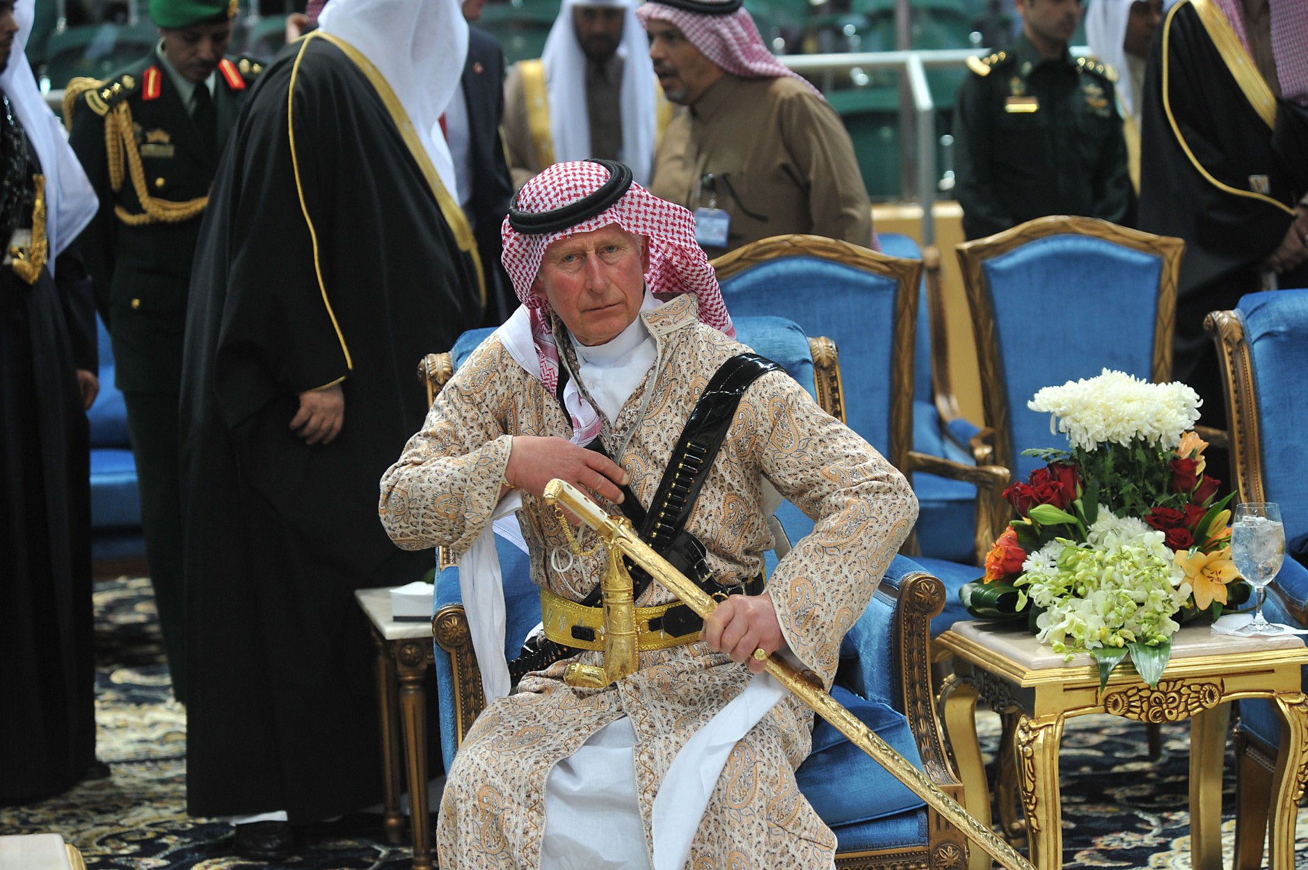 FOR USE AS DESIRED, YEAR END PHOTOS - FILE - Britain's Prince Charles wears a traditional Saudi uniform as he attends the traditional Saudi dancing best known as &quot;Arda,&quot; performed during Janadriya culture festival at Der'iya in Riyadh, Tuesday, Feb. 18, 2014.   (AP Photo/Fayez Nureldine, File Pool)