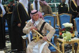 FOR USE AS DESIRED, YEAR END PHOTOS - FILE - Britain's Prince Charles wears a traditional Saudi uniform as he attends the traditional Saudi dancing best known as &quot;Arda,&quot; performed during Janadriya culture festival at Der'iya in Riyadh, Tuesday, Feb. 18, 2014.   (AP Photo/Fayez Nureldine, File Pool)