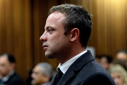 FOR USE AS DESIRED, YEAR END PHOTOS - FILE - In this photo taken Monday March 10, 2014, Oscar Pistorius cries as he listens to cross questioning about the events surrounding the shooting death of his girlfriend Reeva Steenkamp, in court during his trial in Pretoria, South Africa. Pistorius was charged with the shooting death of Steenkamp, on Valentines Day in 2013. (AP Photo/Bongiwe Mchunu, File Pool)