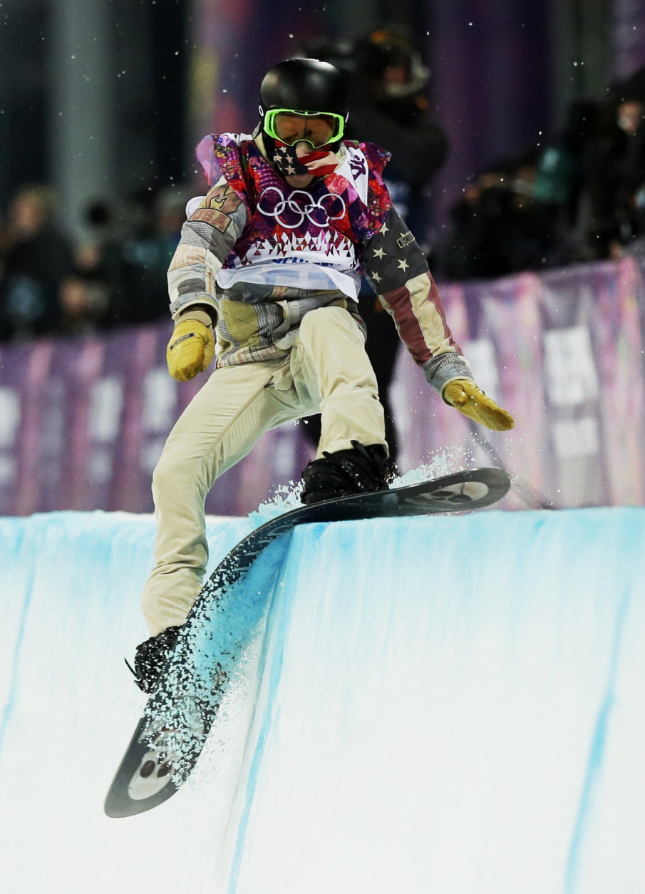 FOR USE AS DESIRED, YEAR END PHOTOS - FILE - Shaun White, of the United States, hits the edge of the half pipe during the men's snowboard halfpipe final at the Rosa Khutor Extreme Park, at the 2014 Winter Olympics, Tuesday, Feb. 11, 2014, in Krasnaya Polyana, Russia. (AP Photo/Andy Wong, File)