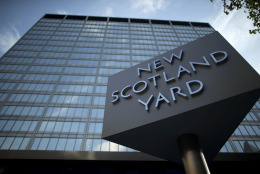 FILE - A Tuesday, Oct. 30, 2012 photo from files showing the sign outside New Scotland Yard, the headquarters building of London's Metropolitan Police force in central London. Scotland Yard, the world's most famous police headquarters, has been sold to Gulf investors who plan to turn it into luxury apartments. The London mayor's office said Tuesday that Abu Dhabi Financial Group had bought the site for 370 million pounds ($580 million), 120 million pounds over the asking price. (AP Photo/Matt Dunham, File)