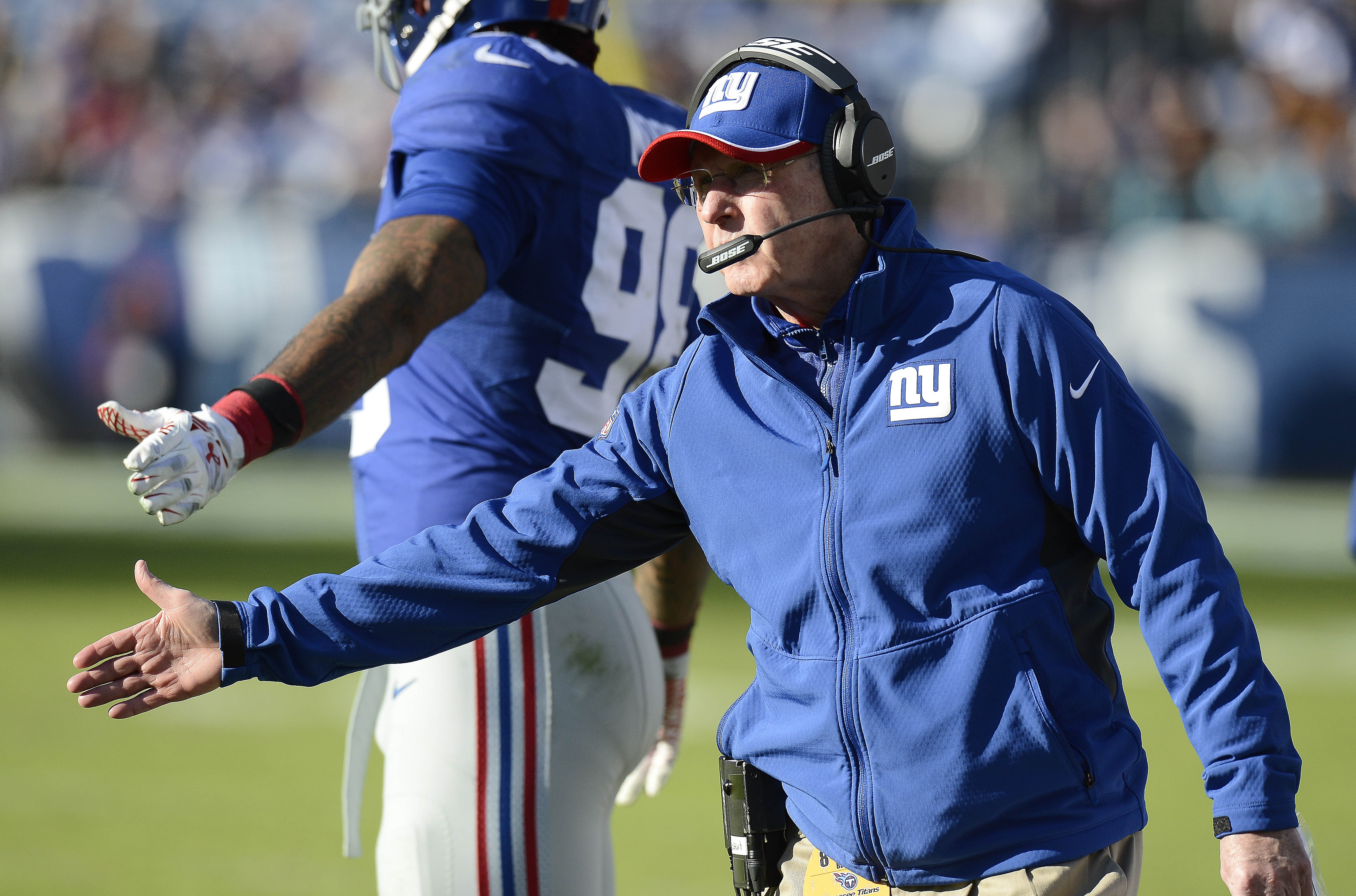 Head coach Tom Coughlin of the New York Giants looks on against the