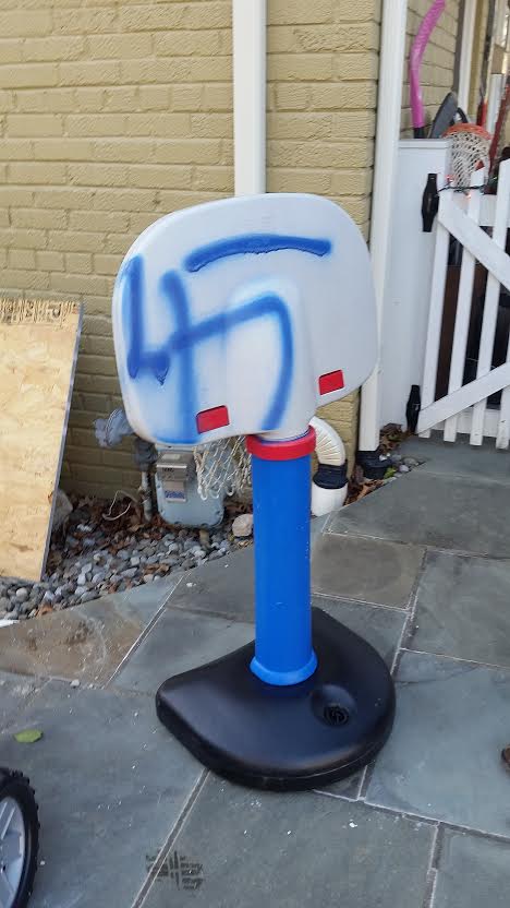 On Friday night and Saturday, unknown vandals spray-painted racial images on several items in Montgomery County, Maryland. (WTOP/Allison Keyes)