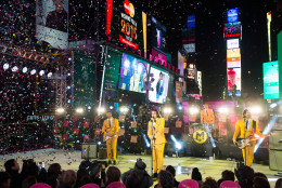 

The band Magic! perform in Times Square during New Year's Eve celebrations on Wednesday, Dec. 31, 2014 in New York. (Photo by Charles Sykes/Invision/AP)