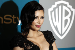 Kim Kardashian arrives at the 2012 Warner Bros. and InStyle Golden Globe After Party at the Beverly Hilton in Los Angeles. on Sunday, Jan. 15, 2012. (AP Photo/Matt Sayles)