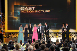 The cast of "Birdman" accepts the award for outstanding performance by a cast in a motion picture on stage during the 21st annual Screen Actors Guild Awards at the Shrine Auditorium on Sunday, Jan. 25, 2015, in Los Angeles. (Photo by Vince Bucci/Invision/AP)