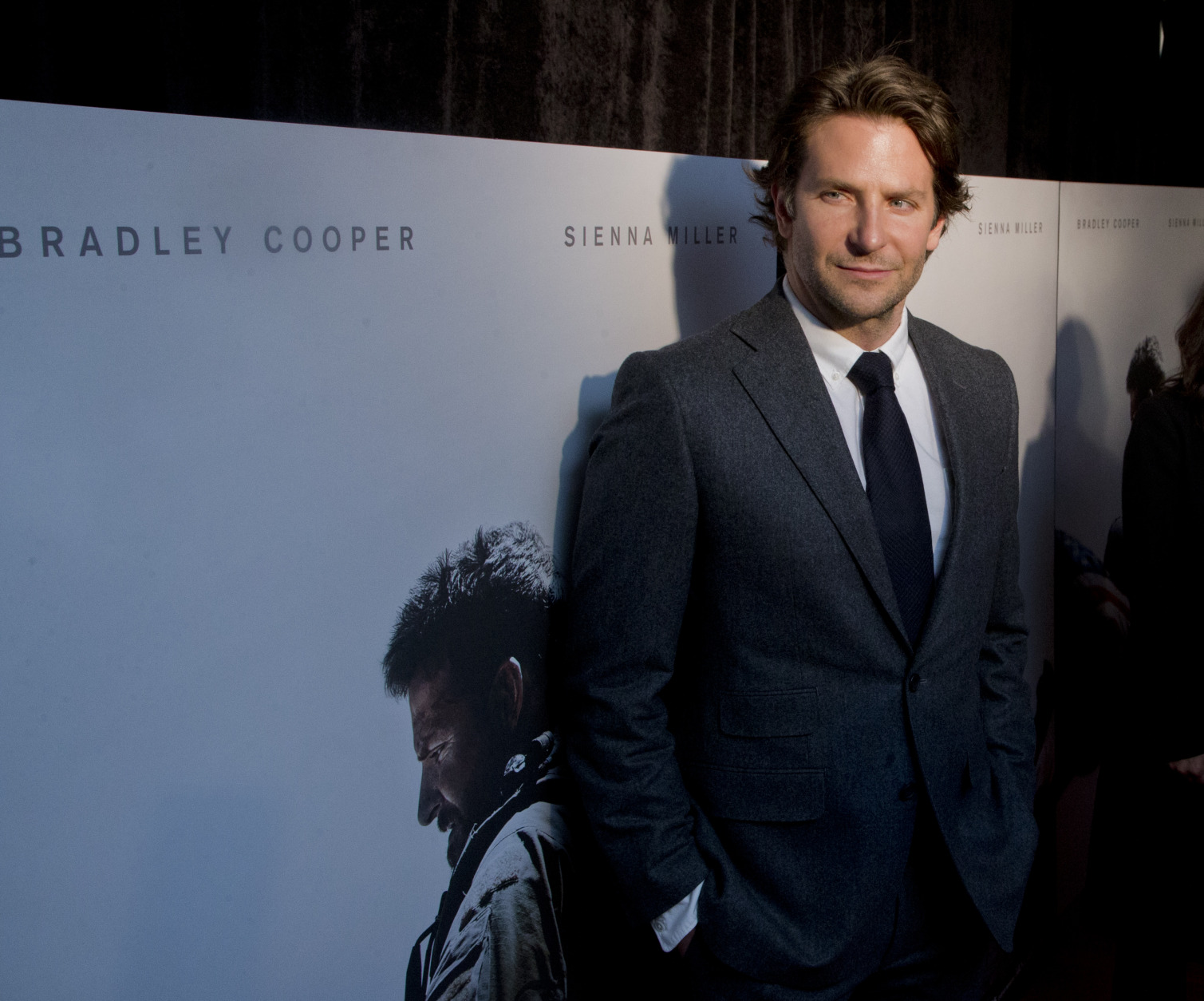 Actor Bradley Cooper arrives at the Washington premiere of the movie American Sniper at Burke Theatre at the U.S. Navy Memorial in Washington, Tuesday, Jan. 13, 2015. Cooper played US Navy SEAL Chris Kyle, the deadliest sniper in American military history and author of the book American Sniper," made into a movie with the same title.  (AP Photo/Manuel Balce Ceneta)