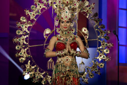 Miss India, Noyonita Lodh, poses for the judges, during the national costume show during the 63rd annual Miss Universe Competition in Miami, Fla., Wednesday, Jan. 21, 2015. (AP Photo/J Pat Carter)
