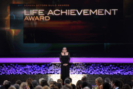 Carrie Fisher presents the life achievement award on stage at the 21st annual Screen Actors Guild Awards at the Shrine Auditorium on Sunday, Jan. 25, 2015, in Los Angeles. (Photo by Vince Bucci/Invision/AP)