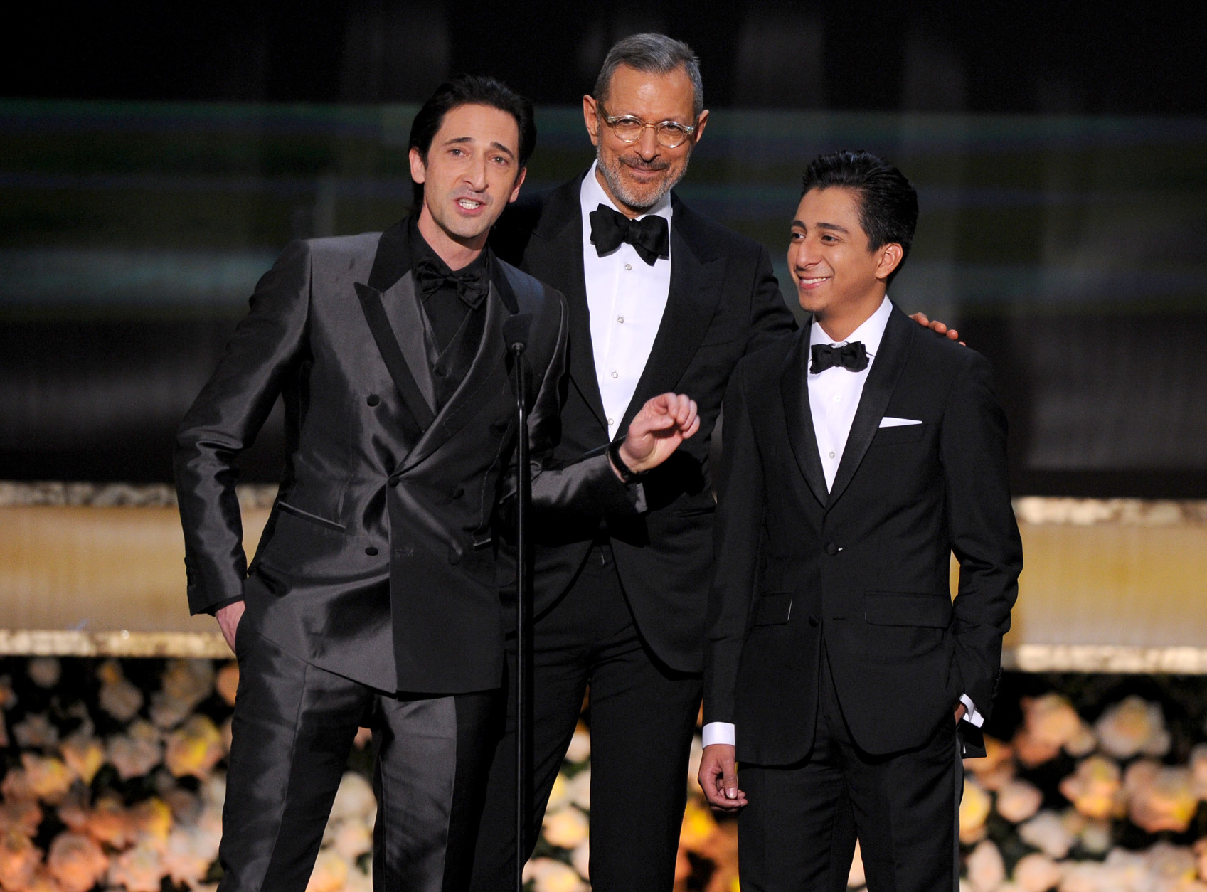 Adrien Brody, from left, Jeff Goldblum and Tony Revolori speak on stage at the 21st annual Screen Actors Guild Awards at the Shrine Auditorium on Sunday, Jan. 25, 2015, in Los Angeles. (Photo by Vince Bucci/Invision/AP)