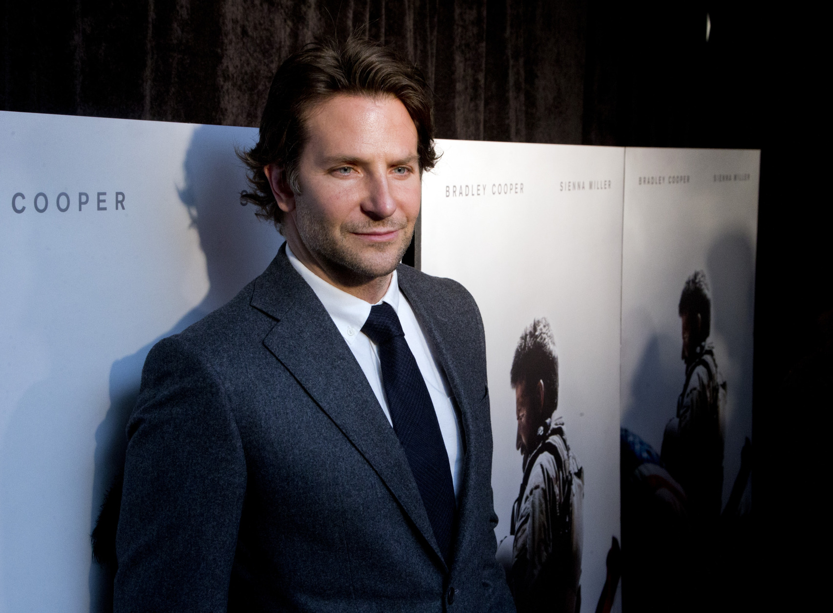 Actor Bradley Cooper arrive at the Washington premiere of the movie American Sniper at Burke Theatre at the U.S. Navy Memorial in Washington, Tuesday, Jan. 13, 2015. Cooper played US Navy SEAL Chris Kyle, the deadliest sniper in American military history and author of the book American Sniper," made into a movie with the same title.  (AP Photo/Manuel Balce Ceneta)