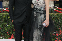 Ty Burrell, left, and Holly Burrell arrive at the 21st annual Screen Actors Guild Awards at the Shrine Auditorium on Sunday, Jan. 25, 2015, in Los Angeles. (Photo by Richard Shotwell/Invision/AP)