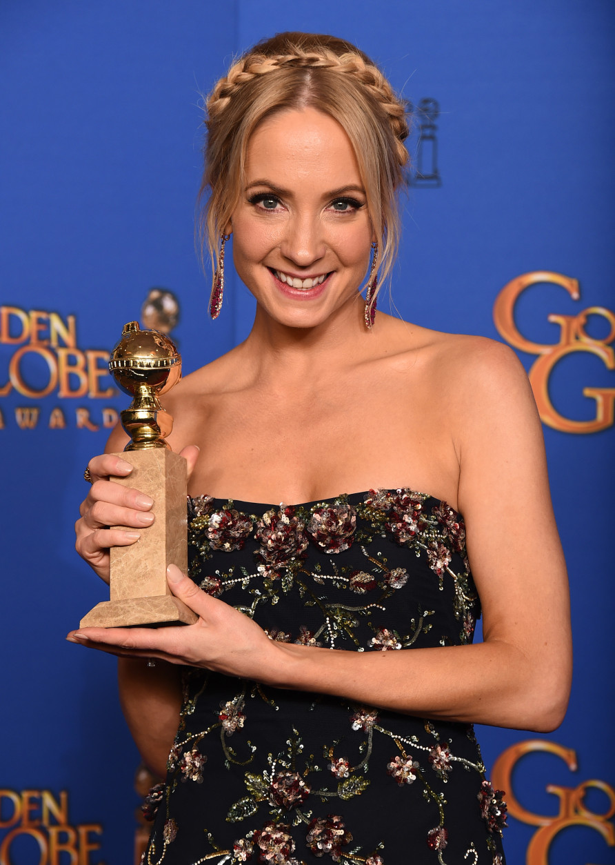 Joanne Froggatt poses in the press room with the award for best supporting actress in a series, miniseries or television movie for Downton Abbey at the 72nd annual Golden Globe Awards at the Beverly Hilton Hotel on Sunday, Jan. 11, 2015, in Beverly Hills, Calif. (Photo by Jordan Strauss/Invision/AP)
